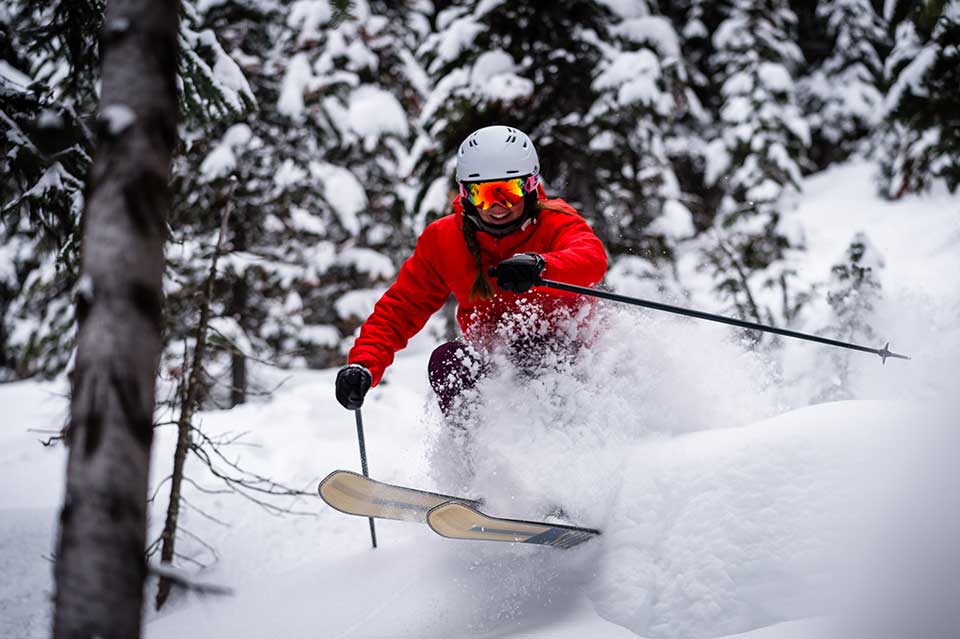 Skier in deep powder at Banff